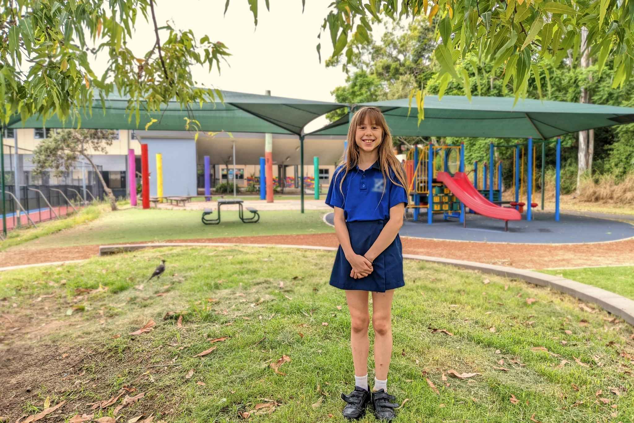 Young girl at school smiling