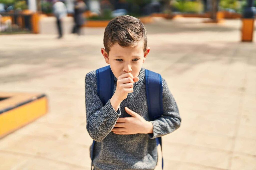 Child Coughing, Illustrating Asthma Symptoms, by Asthma Australia
