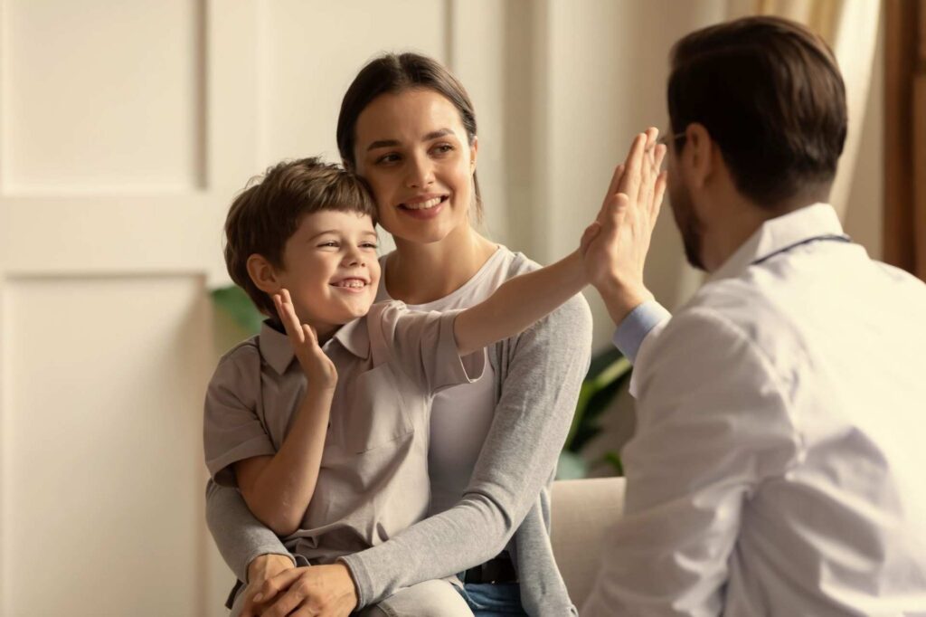 Child High-Fiving Doctor, Promoting Positive Asthma Care Experiences, by Asthma Australia
